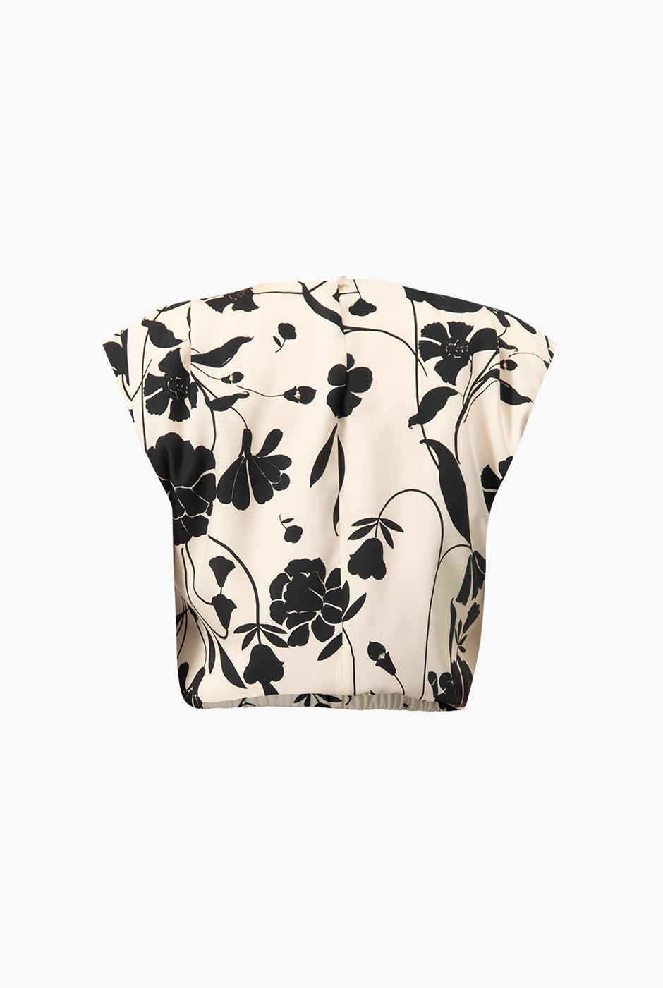 Blusa estampada sin mangas con diseño floral en blanco y negro