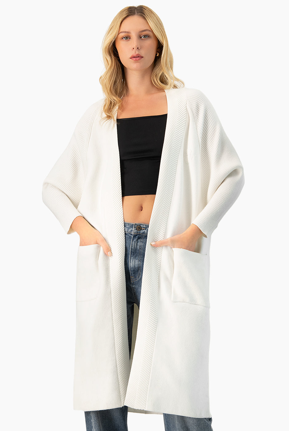 Cárdigan largo tejido blanco con bolsillos delanteros